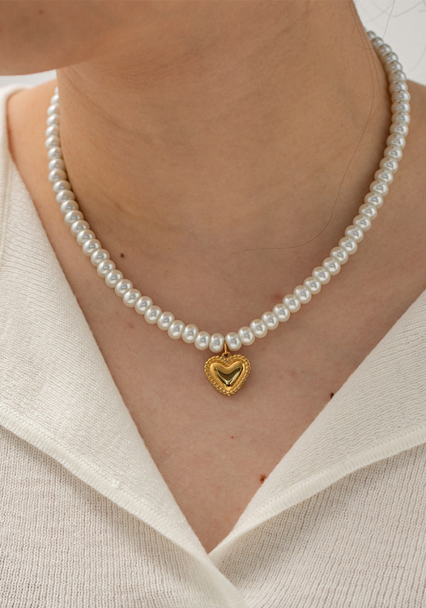 El collar con colgante de amor de perla chapado en oro de 18 quilates de tendencia europea y americana neta estilo ins no se desvanece