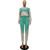 Conjunto de pantalones casuales de dos piezas con capucha y contraste de patchwork para mujer