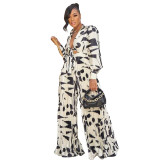 Conjunto de dos piezas de pantalones de pierna ancha plisados ​​con parte superior de moda estampada para mujer