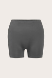Pantalones cortos deportivos estampados en color liso para mujer