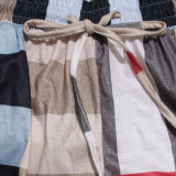 Conjunto de pantalones de dos piezas de manga corta con estampado a cuadros para mujer informal de primavera y verano