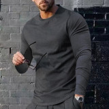 Camiseta básica de manga larga con cuello redondo y color liso para hombre