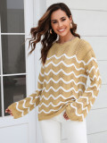 Women knitting long sleeve striped cutout sweater