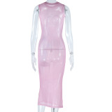 Eng anliegendes Kleid mit Rundhalsausschnitt und Digitaldruck. Ärmelloses, figurbetontes Kleid