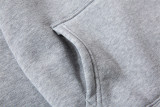 Conjunto de pantalones con capucha gris claro con estampado suelto de otoño e invierno