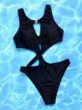 Sexy Solid Color Hollow One-Piece Swimsuit