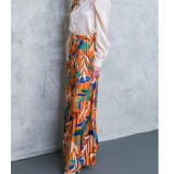 Fashionable Printed Long-Sleeved Top And Pleated Skirt Two-Piece Set