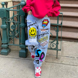 Women printed ripped denim pants