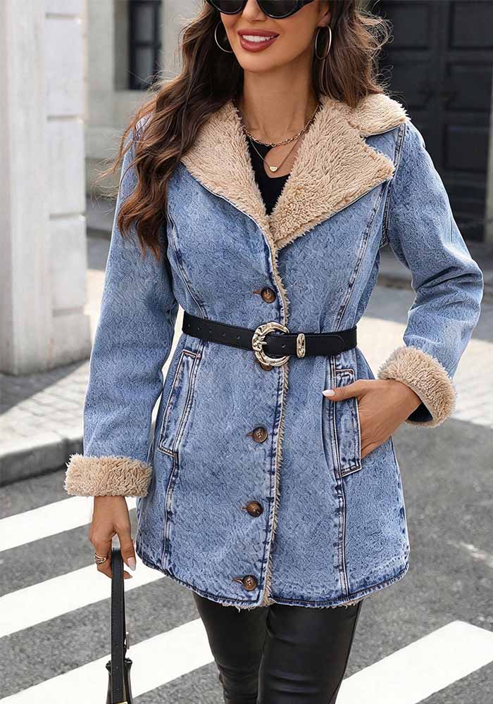 Blue button-front denim jacket with beige textured collar and cuffs.