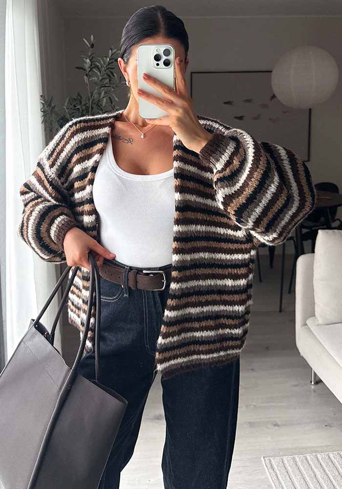 A brown, black and cream striped cardigan has an open front and long sleeves.