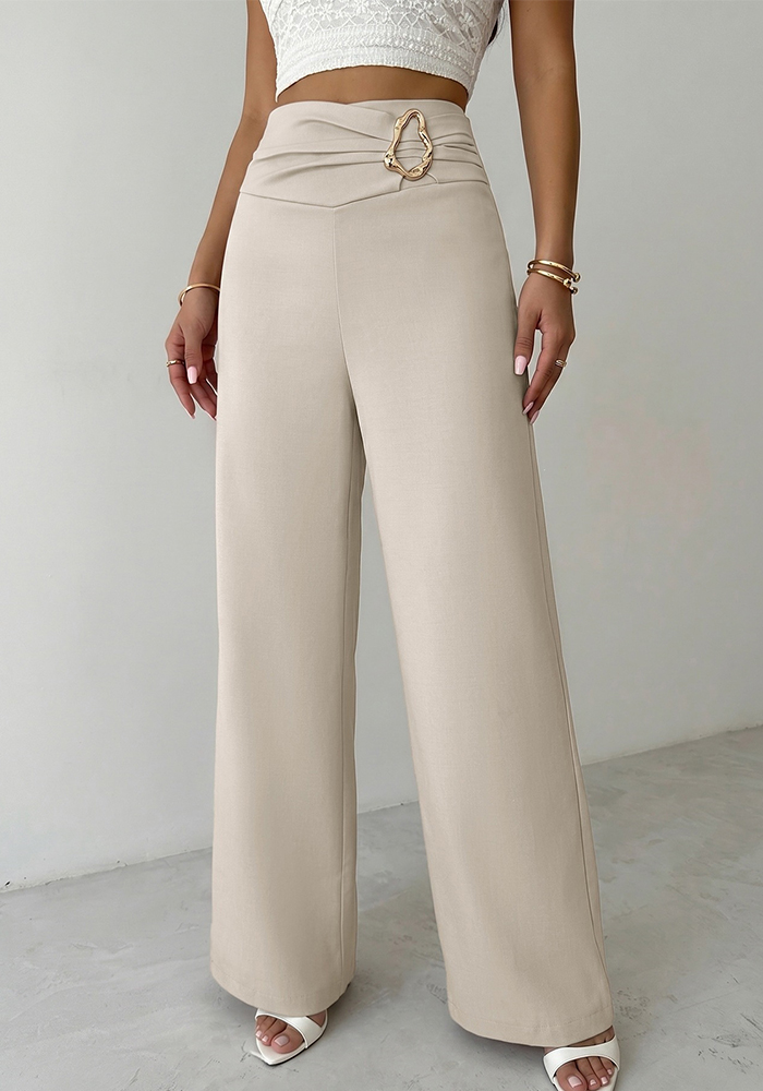 Beige wide-leg trousers have a gathered waist with a gold-tone oval buckle.