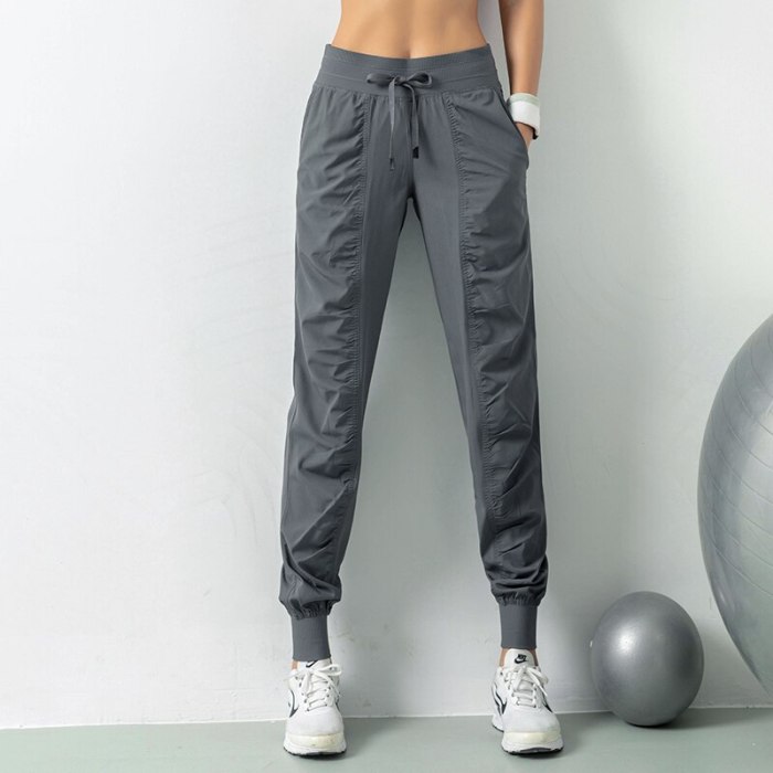 Loose Sports Pants Women Running Yoga Pants Pocket Elastic Waist Fitness Trousers Gym Pants Sport Training Trouser Ladies