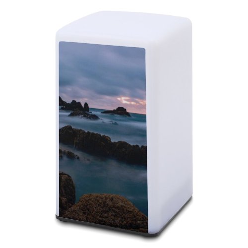 A Small Desk Lamp Sea Ocean  Rocks Sky Clouds Sunset Horizon Lighthouse