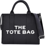 Black canvas tote bag for women with adjustable strap, wearable as a crossbody handbag or shoulder tote

Stylish canvas tote bag for women with adjustable crossbody strap

This Canvas Tote Bag for women features a minimalist design, durable canvas material, secure zipper closure, and an adjustable strap. Designed to be worn as a tote or crossbody handbag, it combines style and everyday practicality.