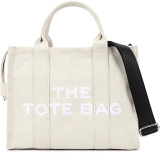 Black canvas tote bag for women with adjustable strap, wearable as a crossbody handbag or shoulder tote

Stylish canvas tote bag for women with adjustable crossbody strap

This Canvas Tote Bag for women features a minimalist design, durable canvas material, secure zipper closure, and an adjustable strap. Designed to be worn as a tote or crossbody handbag, it combines style and everyday practicality.