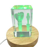 small crystal ornament with a small implant