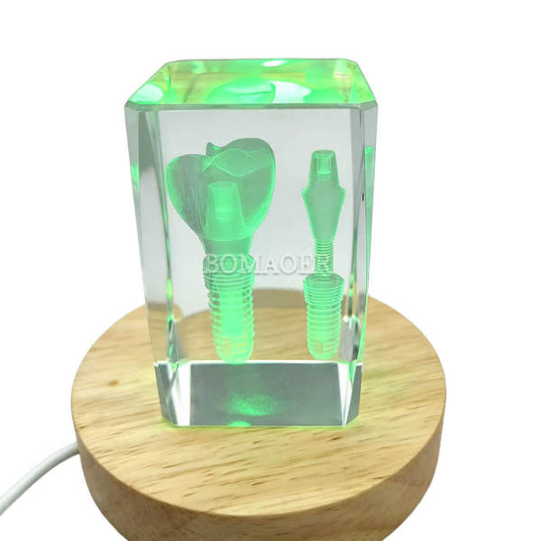small crystal ornament with a small implant